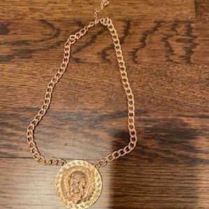 Gold statement necklace for woman - lion front